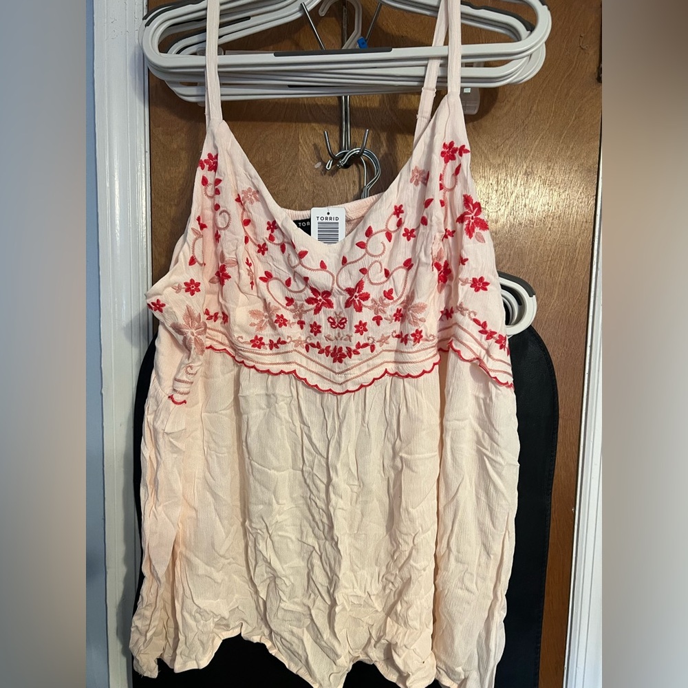 Pale pink babydoll tank with red embroidered flowers